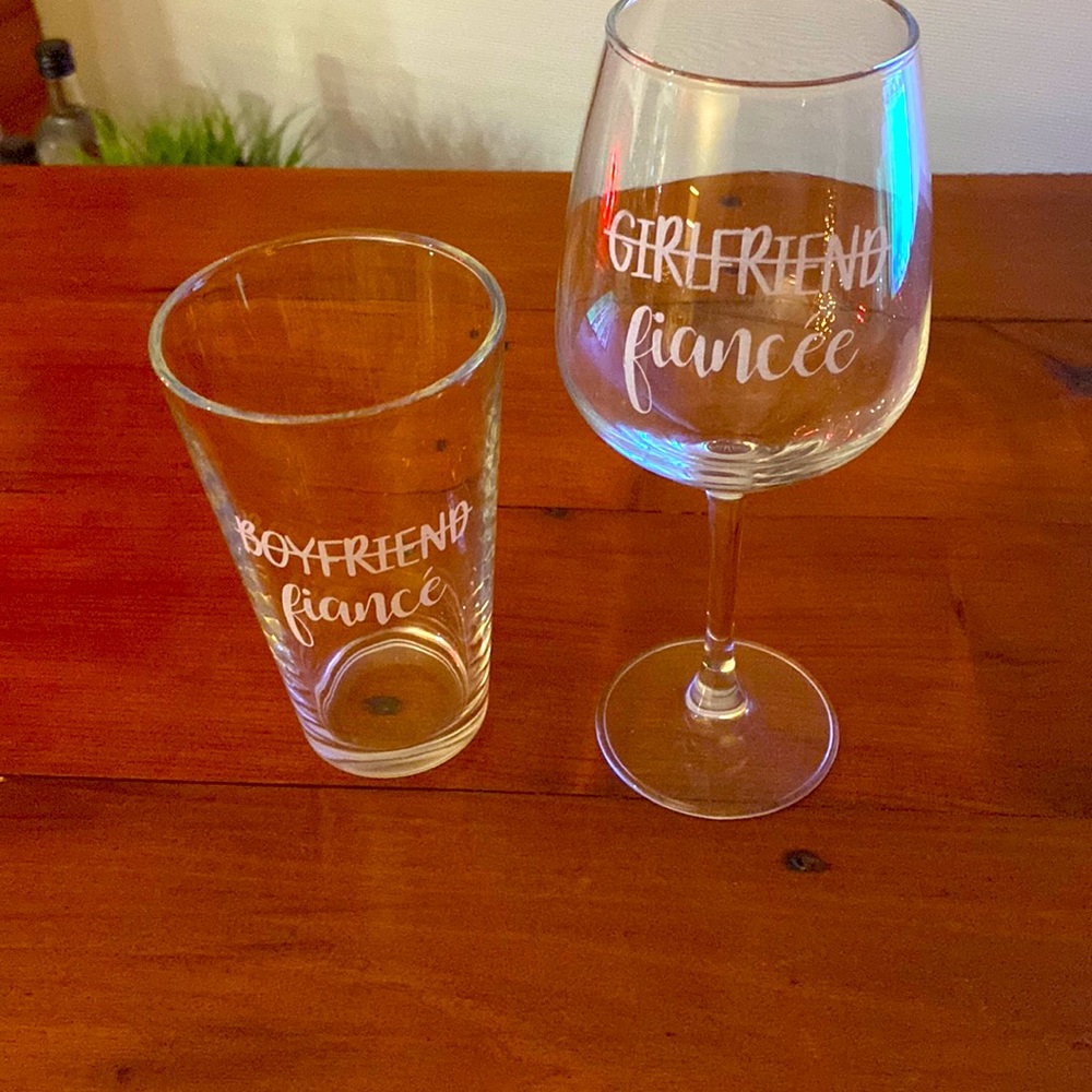 Pair of Fiancé glassware. One beer glass, one wine glass.
